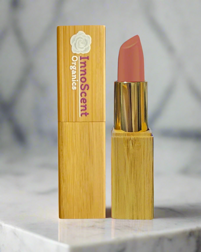 Naked Peach Lipstick in eco-friendly, refillable bamboo packaging, displayed on a clean white background. The soft peach shade of the lipstick stands out, emphasizing the natural and sustainable elegance of the product.