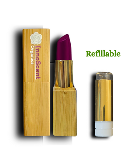 A beautifully crafted lipstick showcased alongside its refillable bamboo packaging, highlighting sustainable and eco-conscious design for mindful beauty enthusiasts